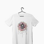 a white t-shirt with floral buddha artwork