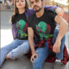 a couple wearing black color t-shirt with alien graphic printed on chest