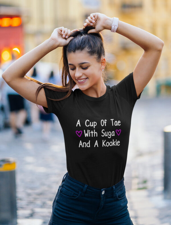 a cute Women wearing black color BTS t-shirt