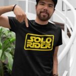 Black t-shirt with Yellow 'Solo Rider' graphic design on the front