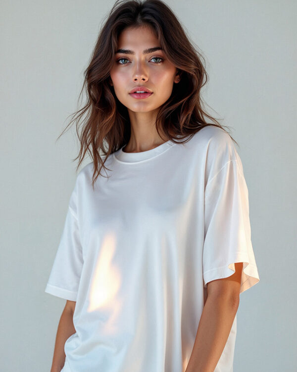 a women wearing a white baggy t-shirt