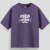 Purple oversized unisex T-shirt with Malayalam text "Thrissurkaran" and mustache graphic in white print, representing Thrissur culture.