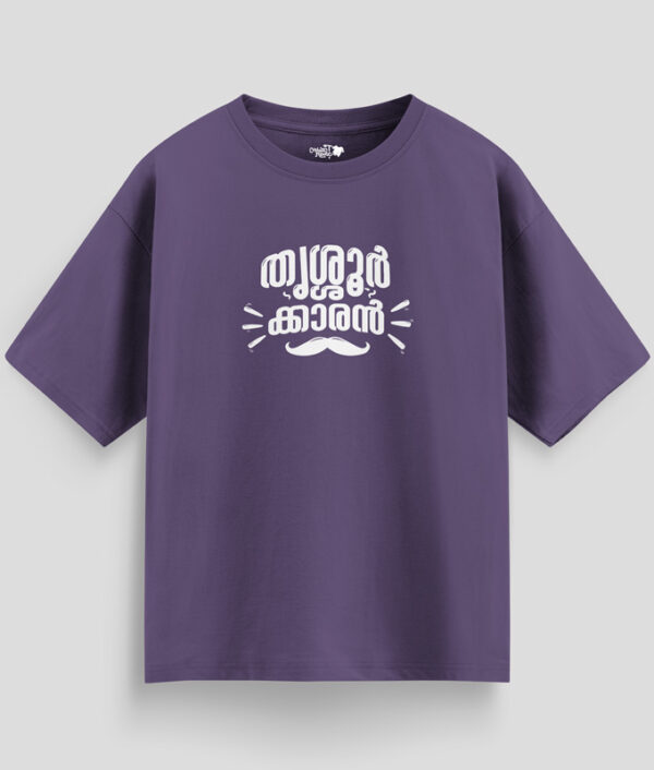 Purple oversized unisex T-shirt with Malayalam text "Thrissurkaran" and mustache graphic in white print, representing Thrissur culture.