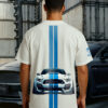 Shelby Mustang T-Shirt featuring blue GT350 car graphic on oversized white t-shirt, worn by model outdoors near Mustang car back view.